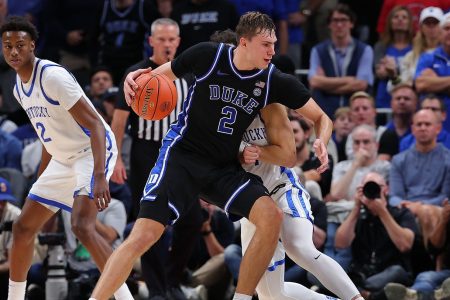 Cooper Flagg #2 of the Duke Blue Devils drives against Koby Brea #4 of the Kentucky Wildcats during the second half of the State Farm Champions Classic between the Kentucky Wildcats and Duke Blue Devils at State Farm Arena on November 12, 2024 in Atlanta, Georgia.