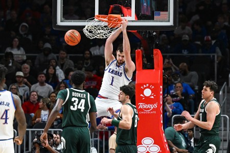 Hunter Dickinson dunks the ball in a game against Michigan State.