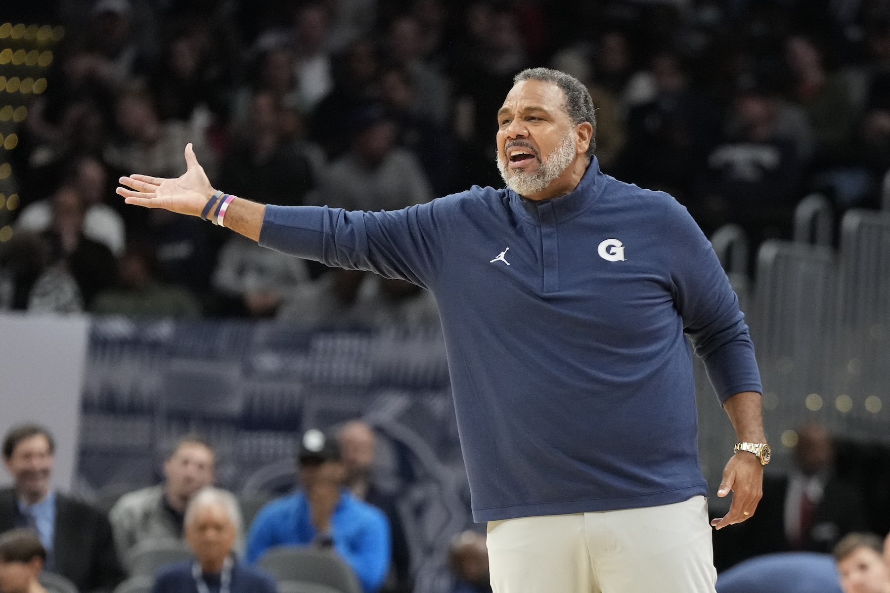 Head coach Ed Cooley of the Georgetown Hoyas reacts to a call during a college basketball game