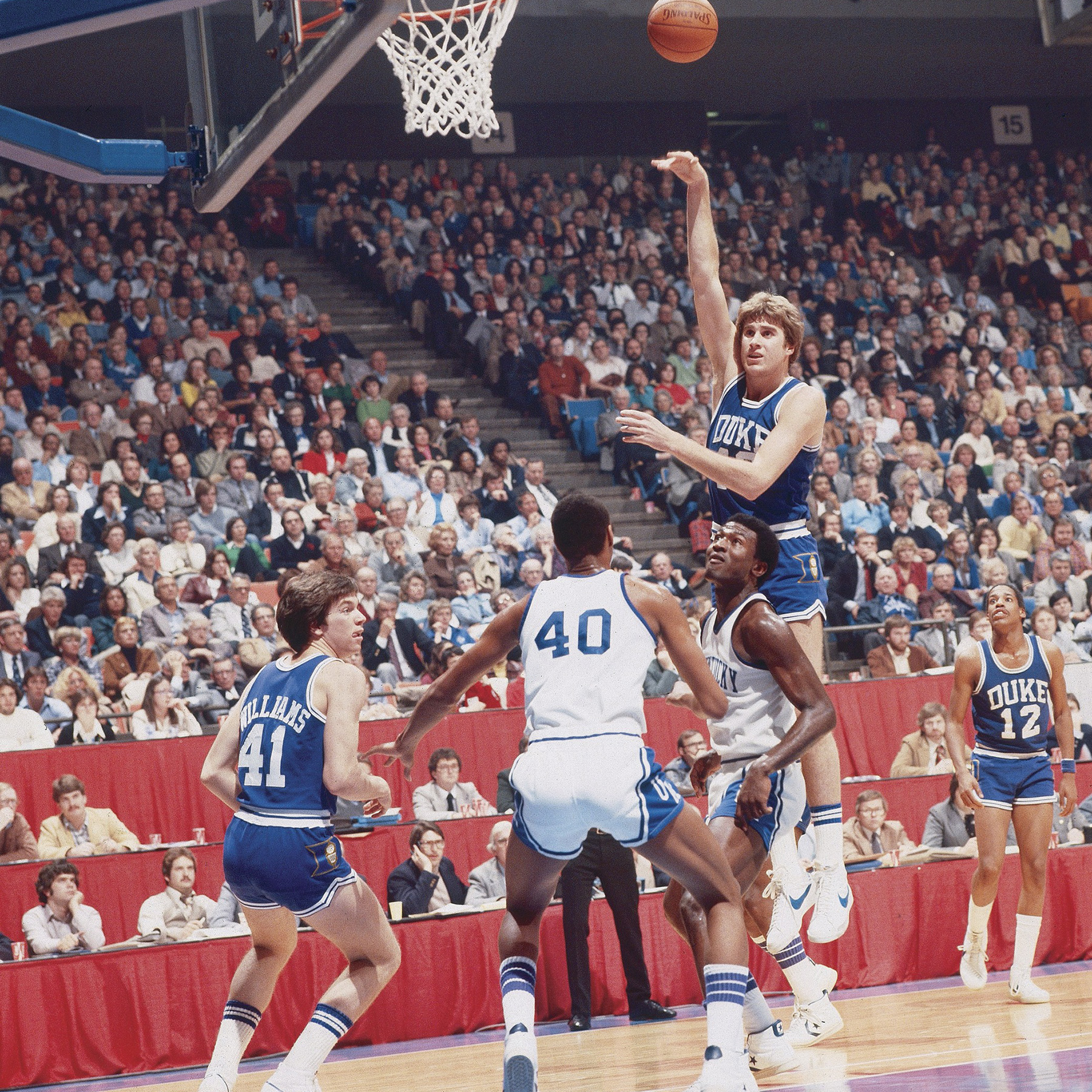 Duke center Mike Gminski elevates for a sky hook during a game against Kentucky.