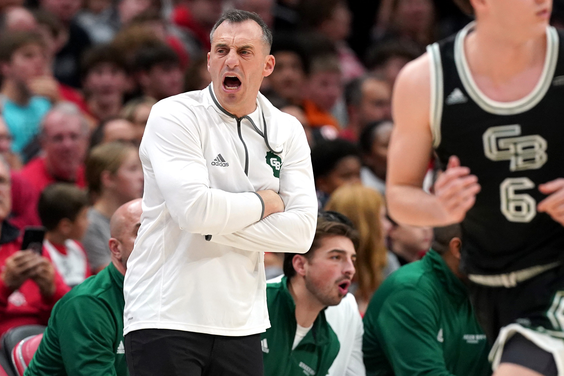 Green Bay head coach Doug Gottlieb lets out a scream on the sideline.