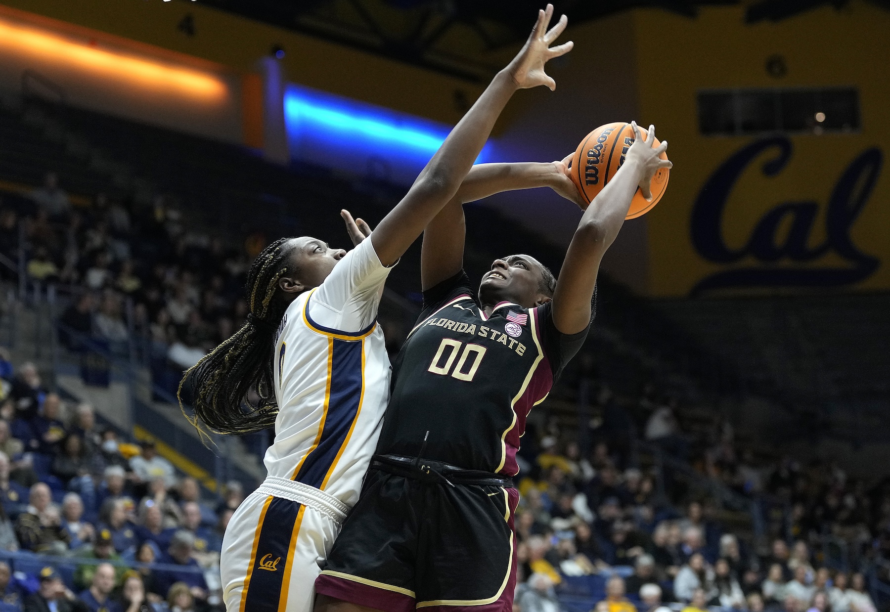 Ta'Niya Latson #00 of the Florida State Seminoles dribbling the ball