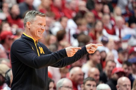 Michigan Wolverines head coach Dusty May reacts during a college basketball game